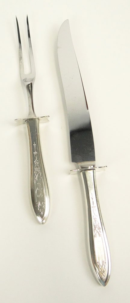 American Two (2) Piece Sterling Silver Handled Carving: American Two (2) Piece Sterling Silver Handled Carving Set in an Unknown Pattern by Unknown Maker. Set Includes: Carving Fork Measuring 11-1/8 Inches, and Carving Knife Measuring 13-1/8 Inches. Signed