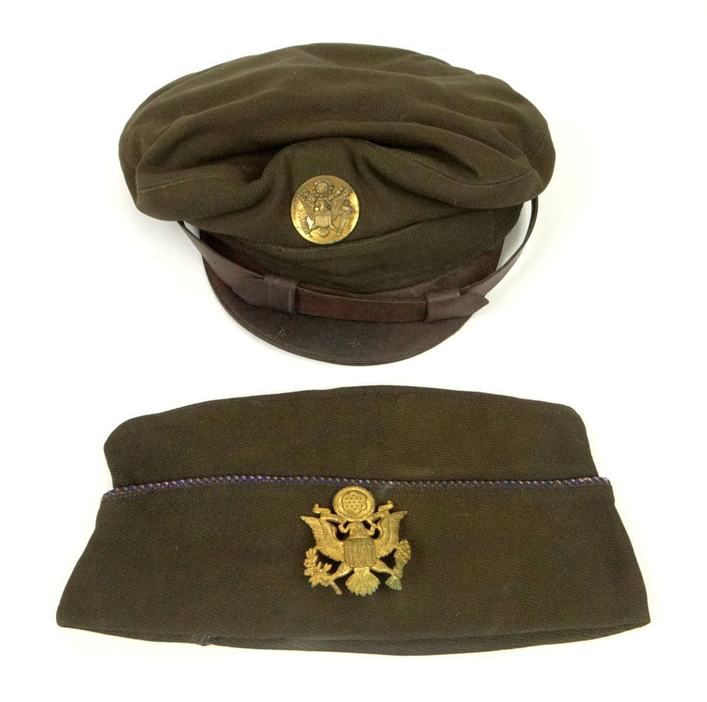 Two (2) Military Hats together with Military Hat Badge.: Two (2) Military Hats together with Military Hat Badge. Well Used Condition. Please Examine This Lot Carefully We are Selling it in "AS IS" Condition. Shipping $34.00