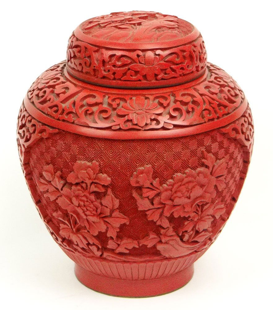 20th Century Chinese Cinnabar style Lacquer and Enamel: 20th Century Chinese Cinnabar style Lacquer and Enamel Covered Ginger Jar. Unsigned. Small Area of Lacquer Loss Otherwise Good Condition. Measures 6-3/4 Inches Tall and 6 Inches Wide. Shipping $38.00