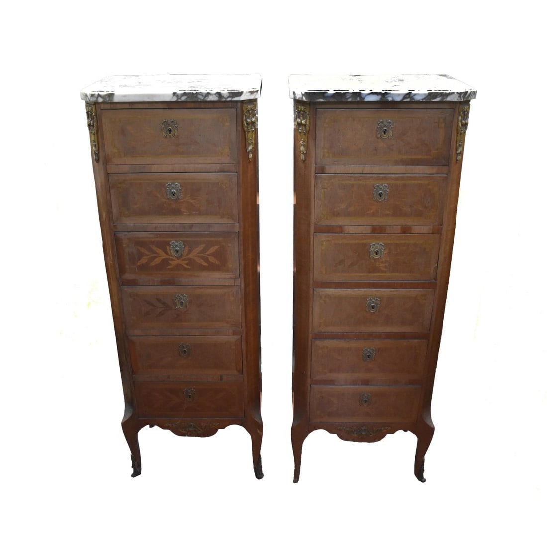 Pair of French Regency Style Lingerie Chests: Antique Pair of French Six (6) Drawer Louis XVI Style Lingerie Inlay Wood Chests with Black Veined Marble Tops and Bronze Escutcheons. Measures: 46-1/2" H, 16-3/4" W, 11-3/4" D. Kodner Galleries