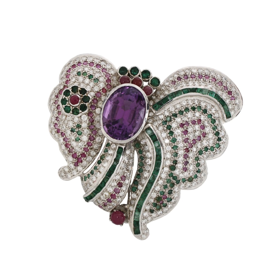 Gemstone and Silver Brooch: Large Vintage Fine Quality Gemstone, Cubic Zirconia and Silver Brooch. Set in the center with an oval cut amethyst and accented with numerous round and baguette cut emeralds and round cut and