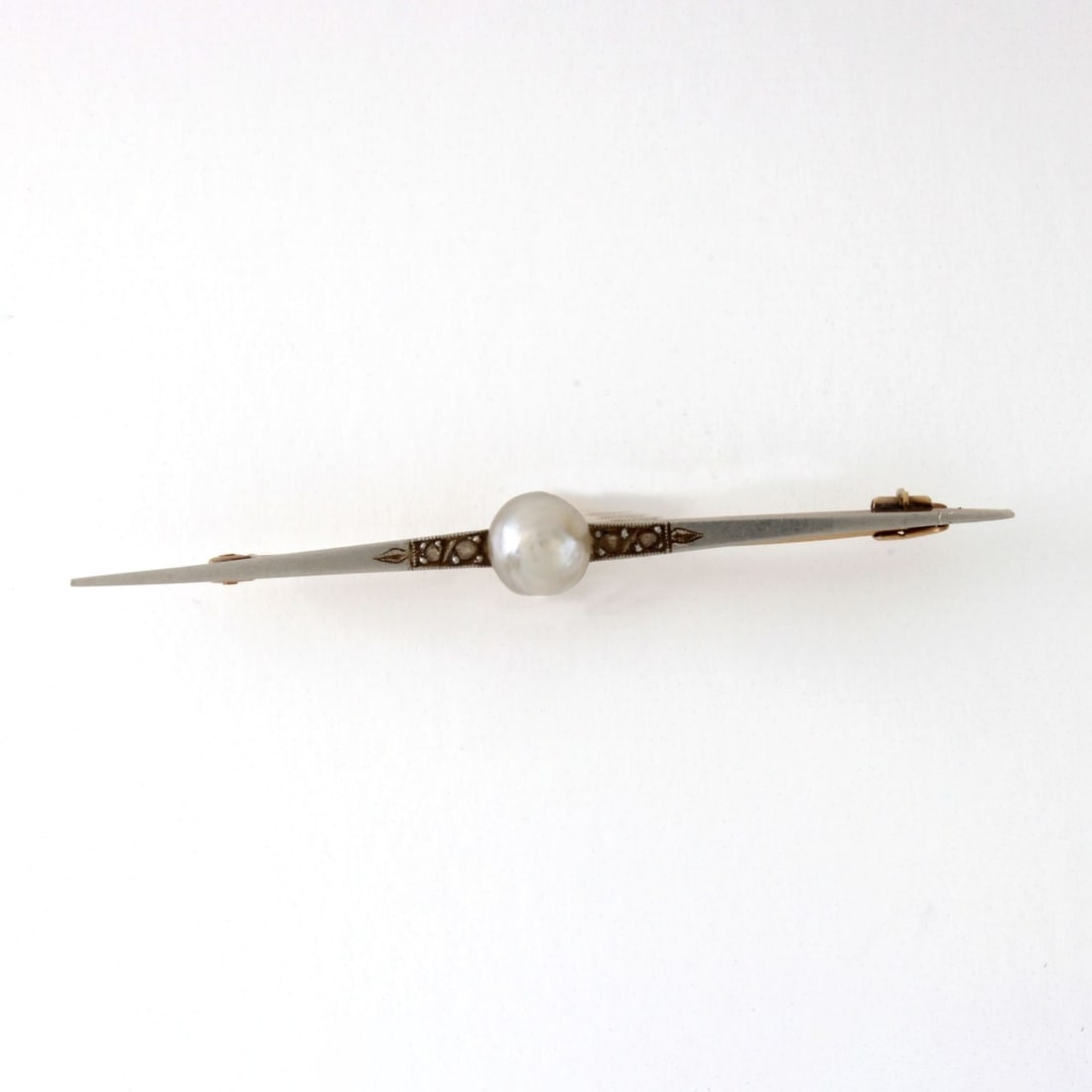 Pearl, Diamond 14K and Platinum Pin: Antique 19th Century 6.5mm Natural Pearl, Small Rose Cut Diamond, 14 Karat Yellow Gold and Platinum Bar Brooch. Pearl with good luster and polish. Pin measures 2-3/8" L. Approx. weight: 3.78 grams.