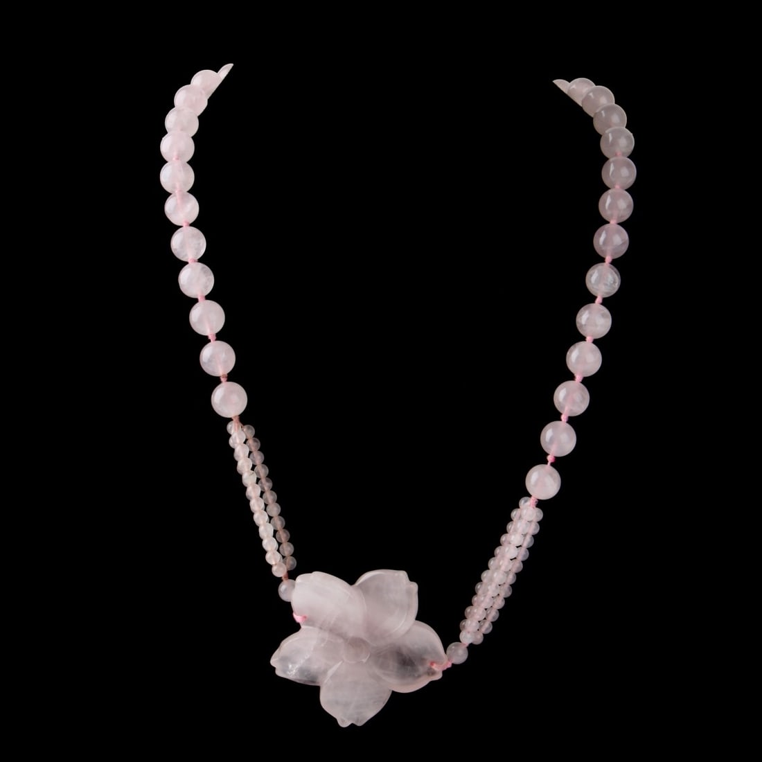 Rose Quartz Necklace: Vintage Rose Quartz Flower Pendant Necklace. Larger beads measure 10mm, pendant measures 2" diam. Necklace measures 32" L. Approx. weight: 120.93 grams. Kodner Galleries offers phone and absentee