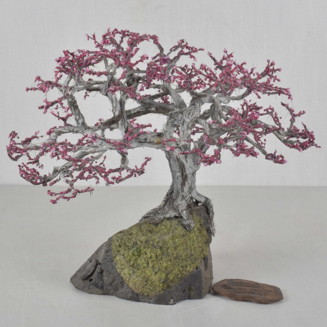 Wayne Trinklein Metal Wire Sculpture: Wayne Trinklein "Redbud Tree" Metal Wire Sculpture on a Stone Base. Signed with the Artist's Seal on the underside and title plate. Overall measures: 11-3/4" high, 14-1/2" wide, 10-1/2" wide. Kodner