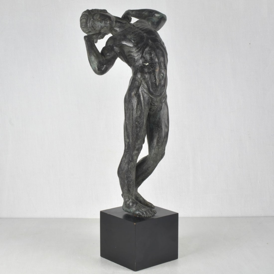 Bronze Sculpture: Vintage Patinated Bronze Sculpture in the style of Auguste Rodin, Male Nude on Metal Base. Unsigned. Sculpture measures 19" H, 12-1/2" W; base measures 4-1/2" H, 5-1/4" sq. Kodner Galleries offers