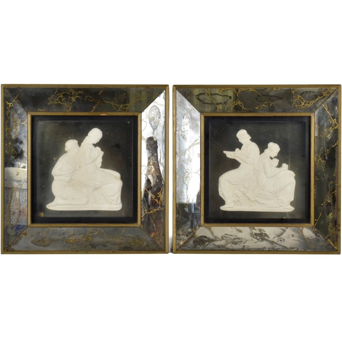 Framed High Relief Grecian Plaques: Two (2) Framed High Relief Grecian Wall Plaques (Appears to be plaster). Viewing window measures: 9-1/2" high, 9-1/2" wide, frame size measures: 15" high, 15" wide, 2" deep. Kodner Galleries offers