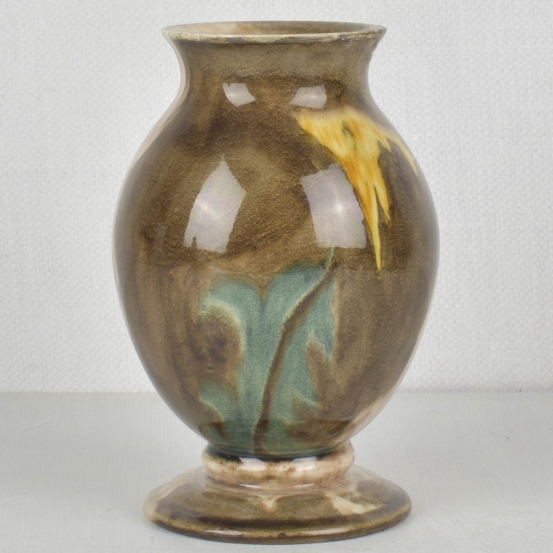 Art Nouveau Rozenburg den Haag Vase: Art Nouveau Rozenburg den Haag Dutch Glazed Pottery Baluster Shape Vase. Circa 1900. Artist signed and numbered to the bottom. Measures: 7-3/8" high, 5" diameter. Kodner Galleries offers phone and abs