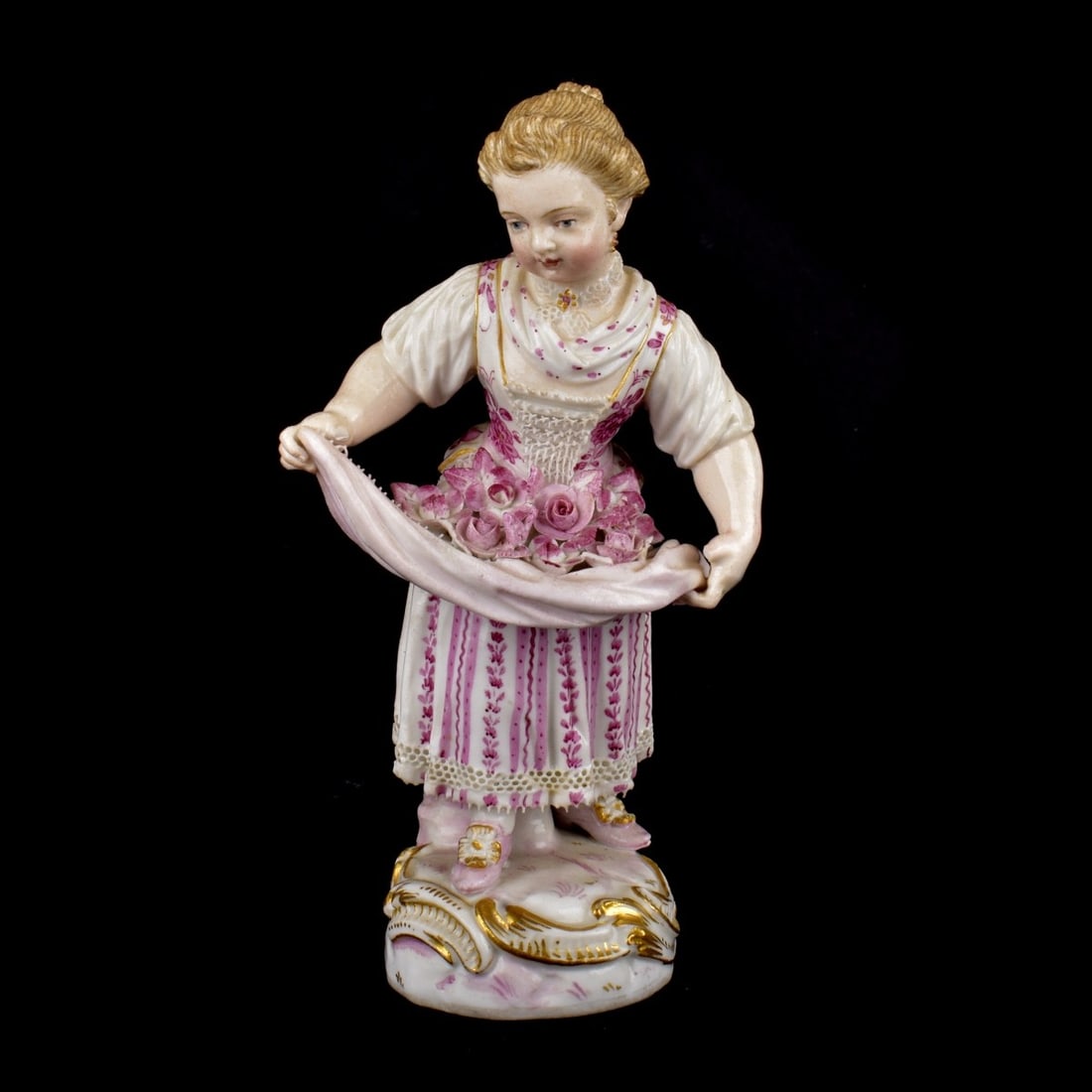 19th Century Meissen Porcelain Figure: 19th Century Meissen Porcelain Figure of a Girl with a Basket of Flowers. Unmarked. Measures 4-3/4" x 2-1/2'. Kodner Galleries offers phone and absentee bidding at a low, flat 21% buyer?s premium