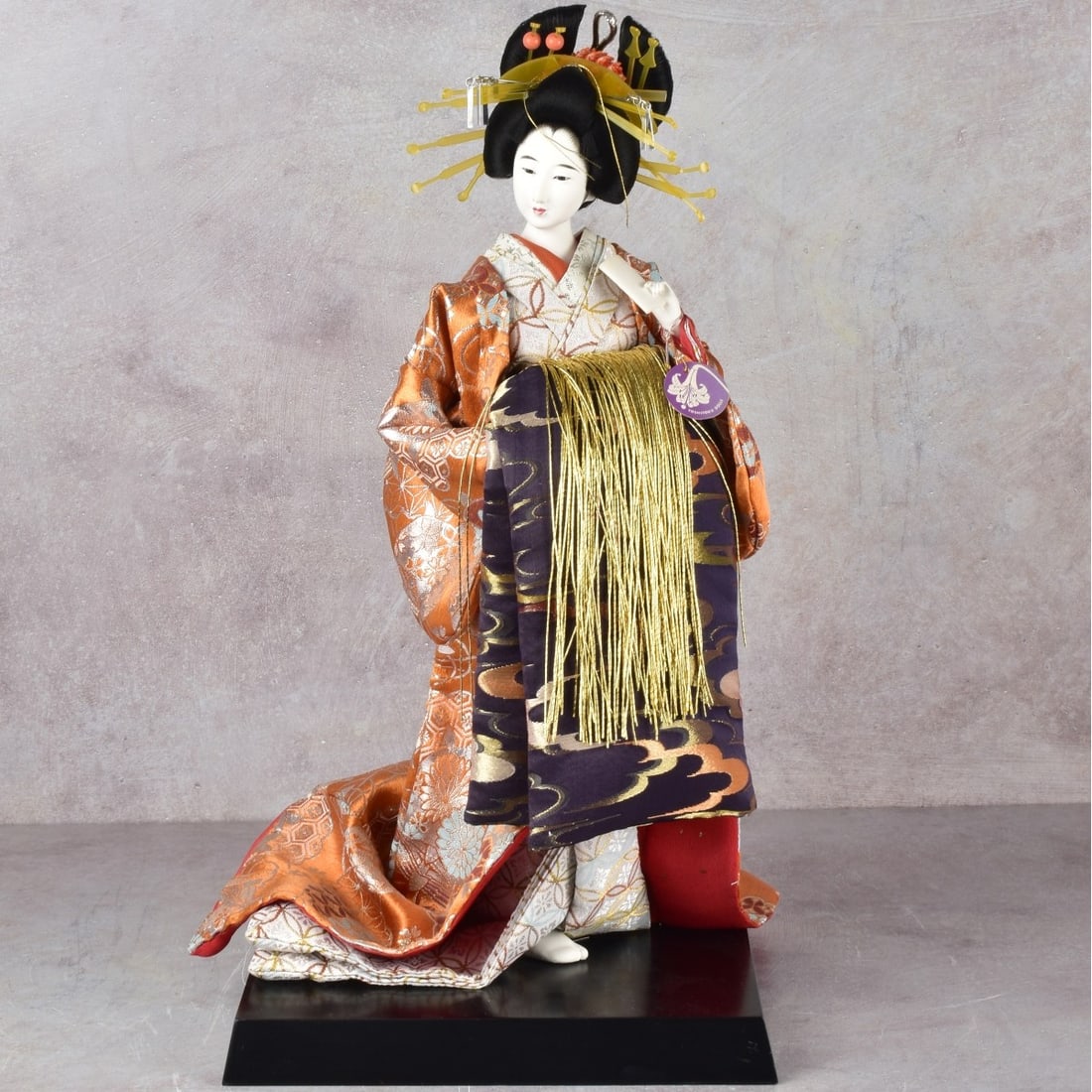 Yoshitok Japanese Geisha Sculpture: Yoshitok Japanese Composite Geisha in Customary Clothing Contained in a Custom Display Case. Doll measures: 17-1/2" high, 7" wide, 5" deep. Kodner Galleries offers phone and absentee bidding at a