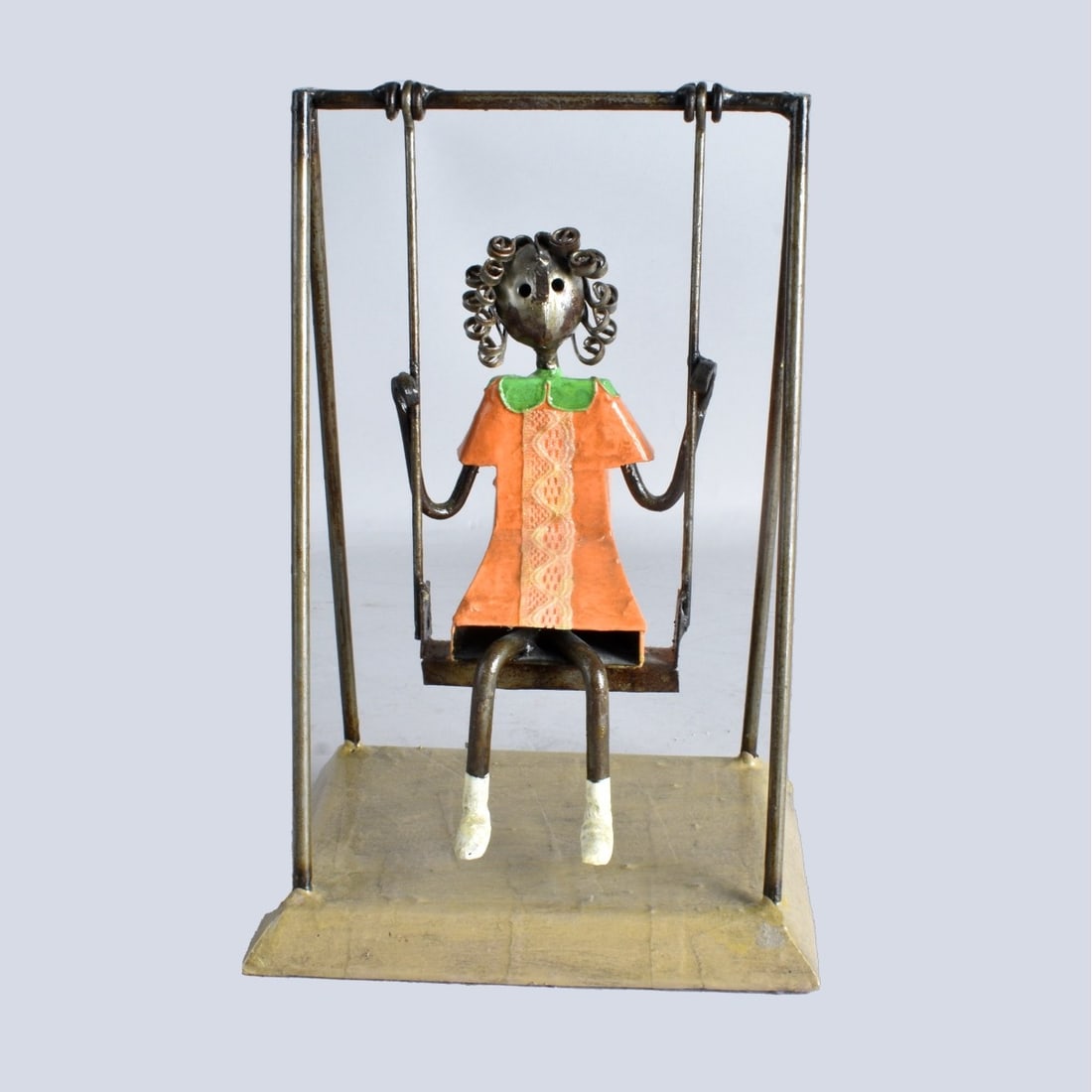 Manuel Felguerez (1928 - 2020) Swing Set Sculpture: Manuel Felguerez, Mexican (1928 - 2020) "Young Boy on Swing Set" Enamel Painted Steel Sculpture, Signed. Label attached on the bottom. Measures 12" x 8" x 6-3/8". Kodner Galleries offers phone and abs