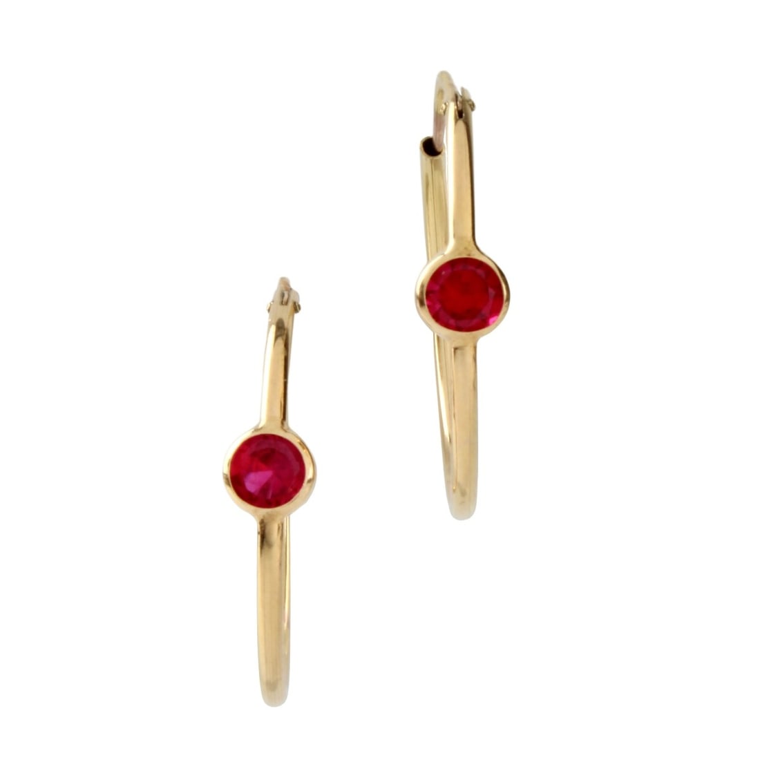 Ruby and 14K Hoop Earrings: 14 Karat Yellow Gold Hoop Earrings Each Set with a Round Cut Man Made Ruby. Earrings measures 1-1/4" diam. Approx. weight: 3.25 grams. Kodner Galleries offers phone and absentee bidding at a low, flat