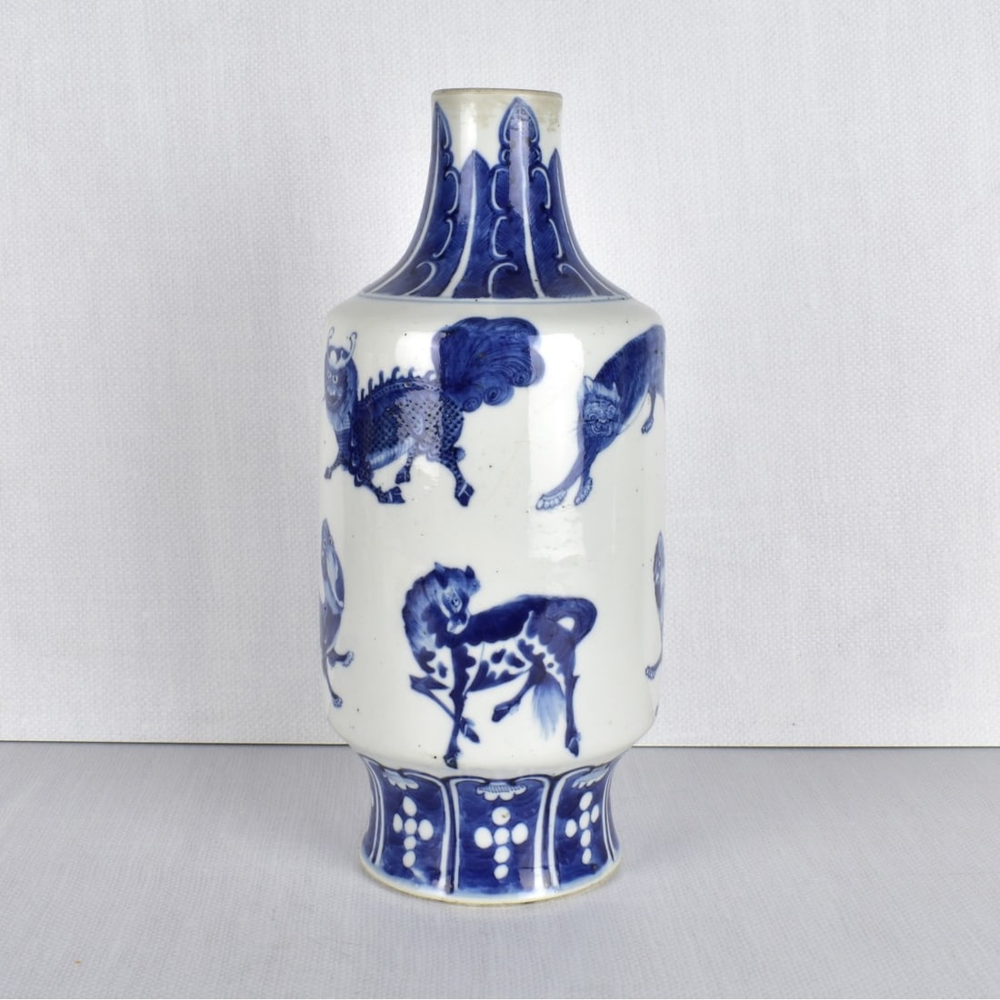19th Century Chinese Blue and White Vase: 19th Century Chinese Blue and White Vase, various animals, signed to bottom and sticker "Chia Ching 1796-1820". Measures 12-3/4" H x 6" W. Kodner Galleries offers phone and absentee bidding at a low, 
