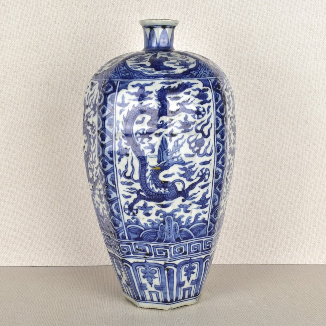 Large Chinese Vase: Large Chinese Jiajing style Blue and White Porcelain Dragon Chasing the Flaming Pearl Pattern Plum Vase. Measures 14" H, 7" W. Kodner Galleries offers phone and absentee bidding at a low, flat 21% buy