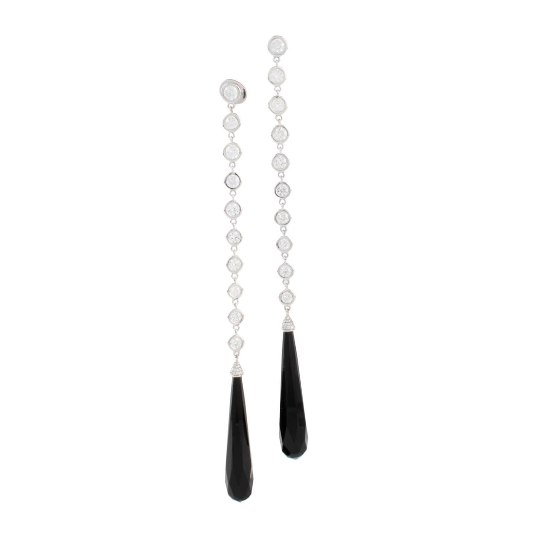 18KW Gold and Diamond Ivanka Trump Earrings: 18K White Gold, Diamond and Black Onyx Dangle Ivanka Trump Earrings. Sixty (60) Round brilliant cut diamonds weighing approximately 5.80 carats, G-H in color and VS in clarity. Earrings measure: 4-7/8