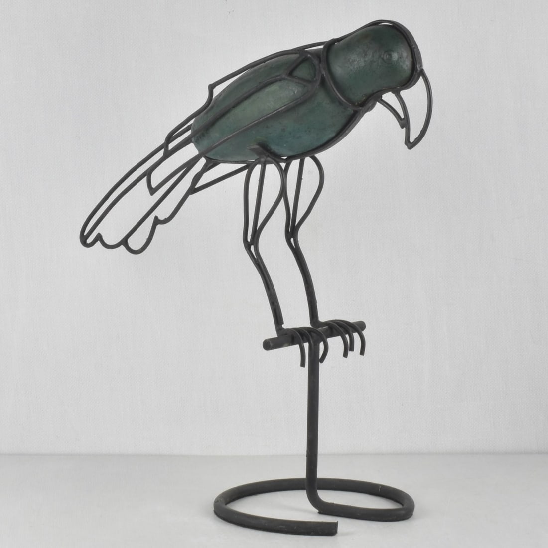 Mid-century Modern Metal Parrot: Mid-century Modern Metal Parrot Form Sculpture. Measures: 22" high, 21" wide, 9" deep. Kodner Galleries offers phone and absentee bidding at a low, flat 21% buyer?s premium without surcharge or hidden