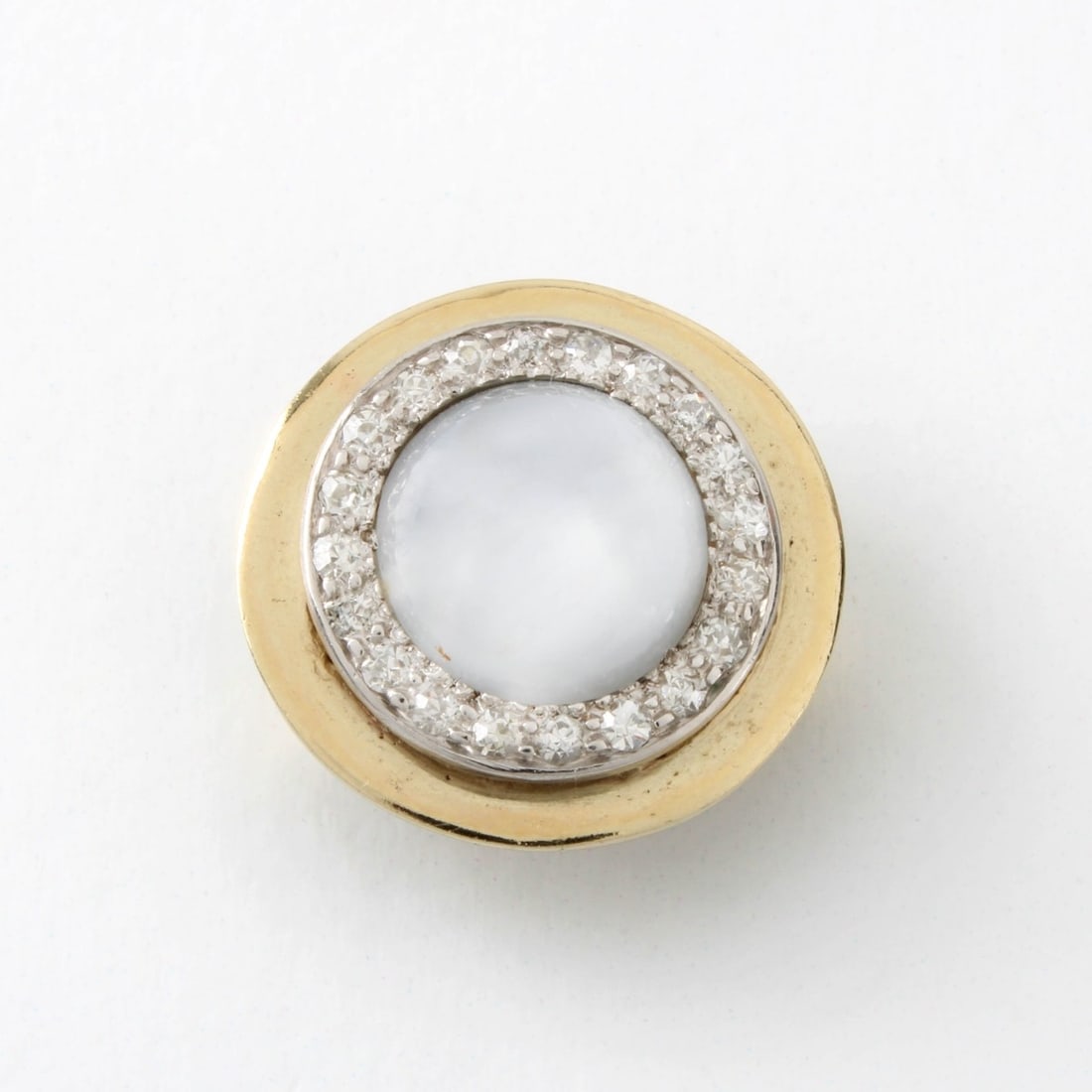 Sapphire, Diamond and 14K Pendant: Vintage Star Sapphire, Round Cut Diamond and 14 Karat Yellow Gold Slide Pendant. Sapphire measures 10mm. Diamonds G-H color, VS clarity. Pendant measures 3/4" diam. Approx. weight: 6.09 grams. Kodner 