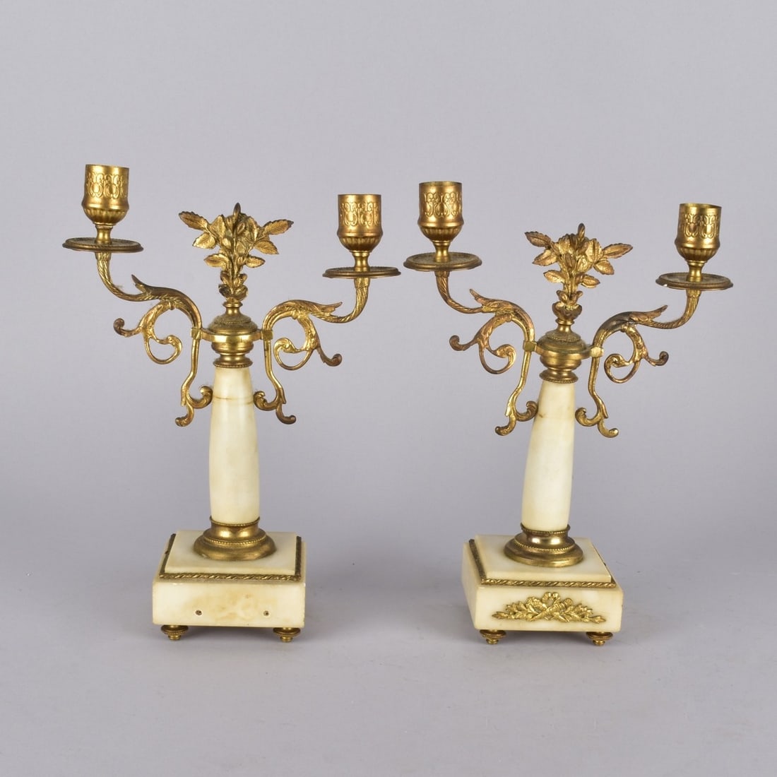 Pair of Empire Style Candlesticks: Pair of Antique Empire Style Bronze and Alabaster Candlesticks. Measures 10-3/4" x 7-3/4". Kodner Galleries offers phone and absentee bidding at a low, flat 21% buyer?s premium without surcharge or hi