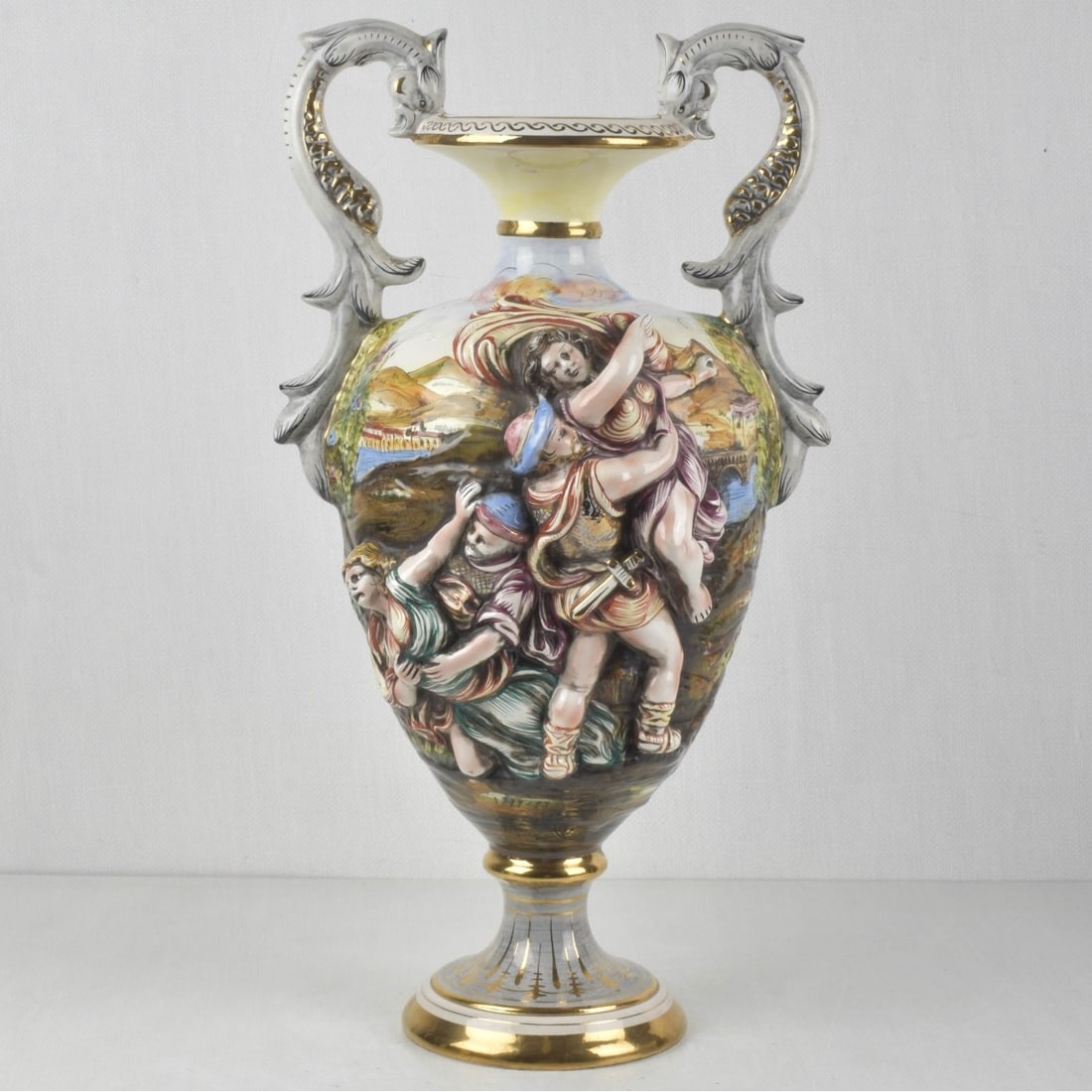 Vintage Italian Capodimonte Vase: Vintage Italian Capodimonte Large Two Handle Porcelain Statue Vase Designed by Luciano Cazzola. Signed and numbered to the bottom. Measures: 22-3/4" high, widest at the two handles: 12-1/2" wide.