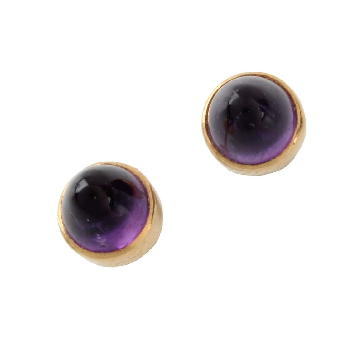 Amethyst and 14K Ear Studs: Vintage Cabochon Amethyst and 14 Karat Yellow Gold Ear Studs. Amethyst with good color. Studs measure 7mm diam. Approx. total weight: 2.18 grams. Kodner Galleries offers phone and absentee bidding at