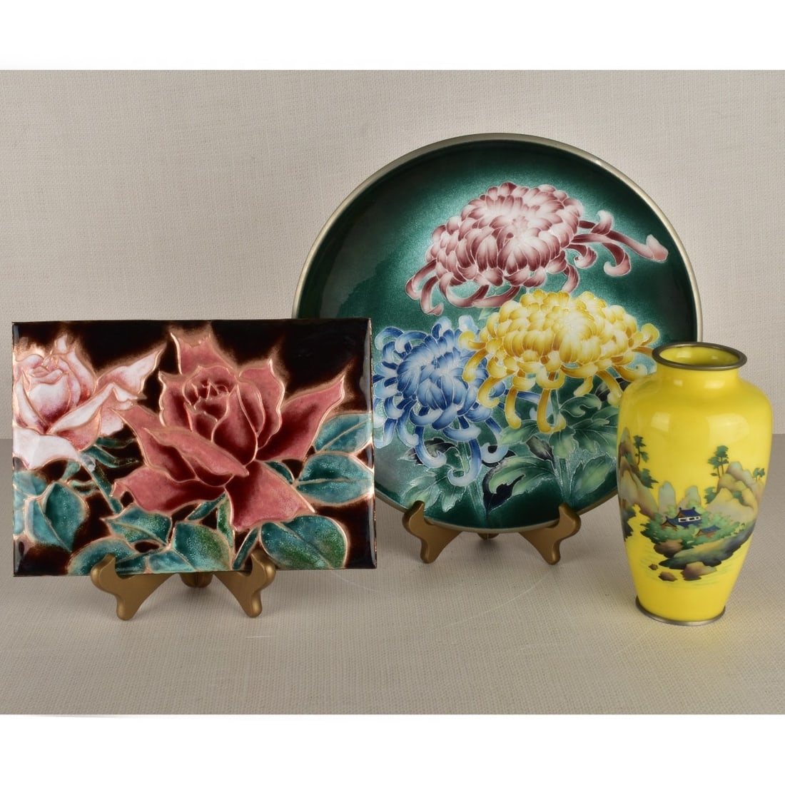 Japanese Cloisonne Items: Three (3) Japanese Cloisonne Items, One (1) Bright Yellow Vase Decorated with a Small Hut on the River Bank and One (1) Platter Decorated with Brightly Enameled Flowers, with Makers Label on the Botto