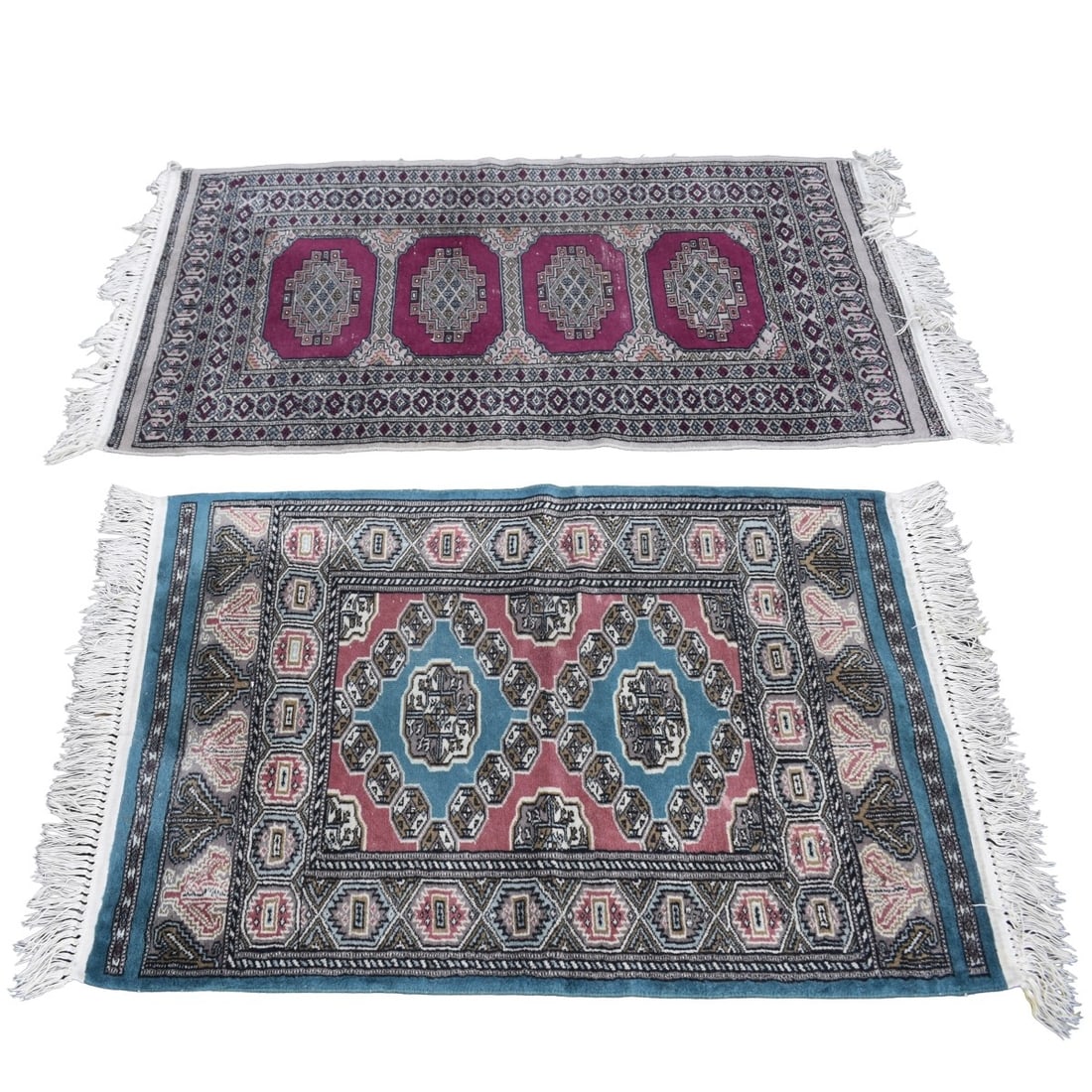 Tribal Wool Rugs: Two (2) Tribal Wool Rugs Hand Made with Fringe. One (1) measures: 46" x 31", one (1) measures: 57" x 31". Kodner Galleries offers phone and absentee bidding at a low, flat 21% buyer?s premium without 