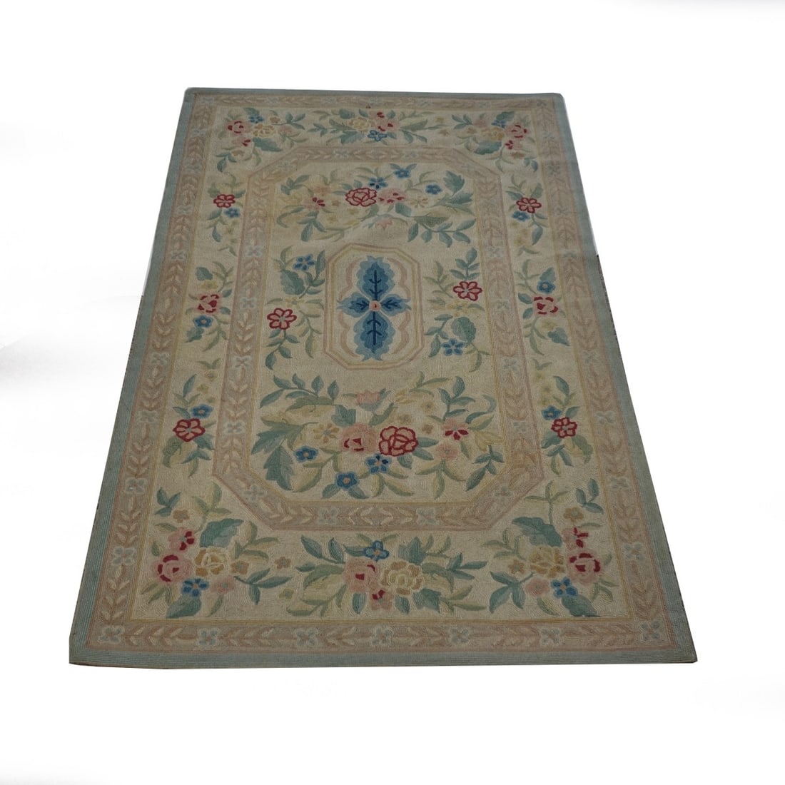Early 20th C. French Style Hooked Rug: Early 20th Century French Style Hooked Rug. Floral embellishments. Measures 7' x 4'. Kodner Galleries offers phone and absentee bidding at a low, flat 21% buyer?s premium without surcharge or hidden f