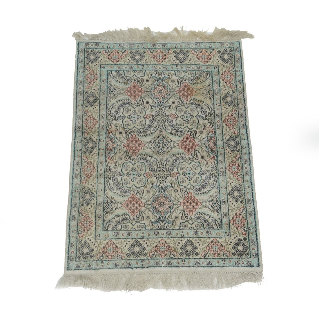 Qum Style Rug: Mid 20th Century Qum Style Silk Rug. Continuous floral design on cream ground. Measures 34-1/2' x 24-3/4". Kodner Galleries offers phone and absentee bidding at a low, flat 21% buyer?s premium without