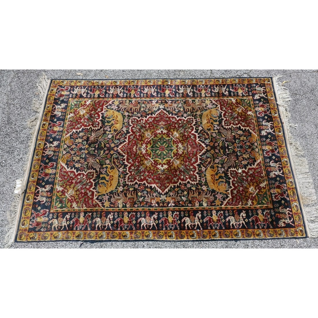 Persian Wool Rug: Semi Antique Persian Wool Rug. Hunting scene with figures on horseback and animals. Measures 24-1/2" x 49-1/2". Kodner Galleries offers phone and absentee bidding at a low, flat 21% buyer?s premium wi