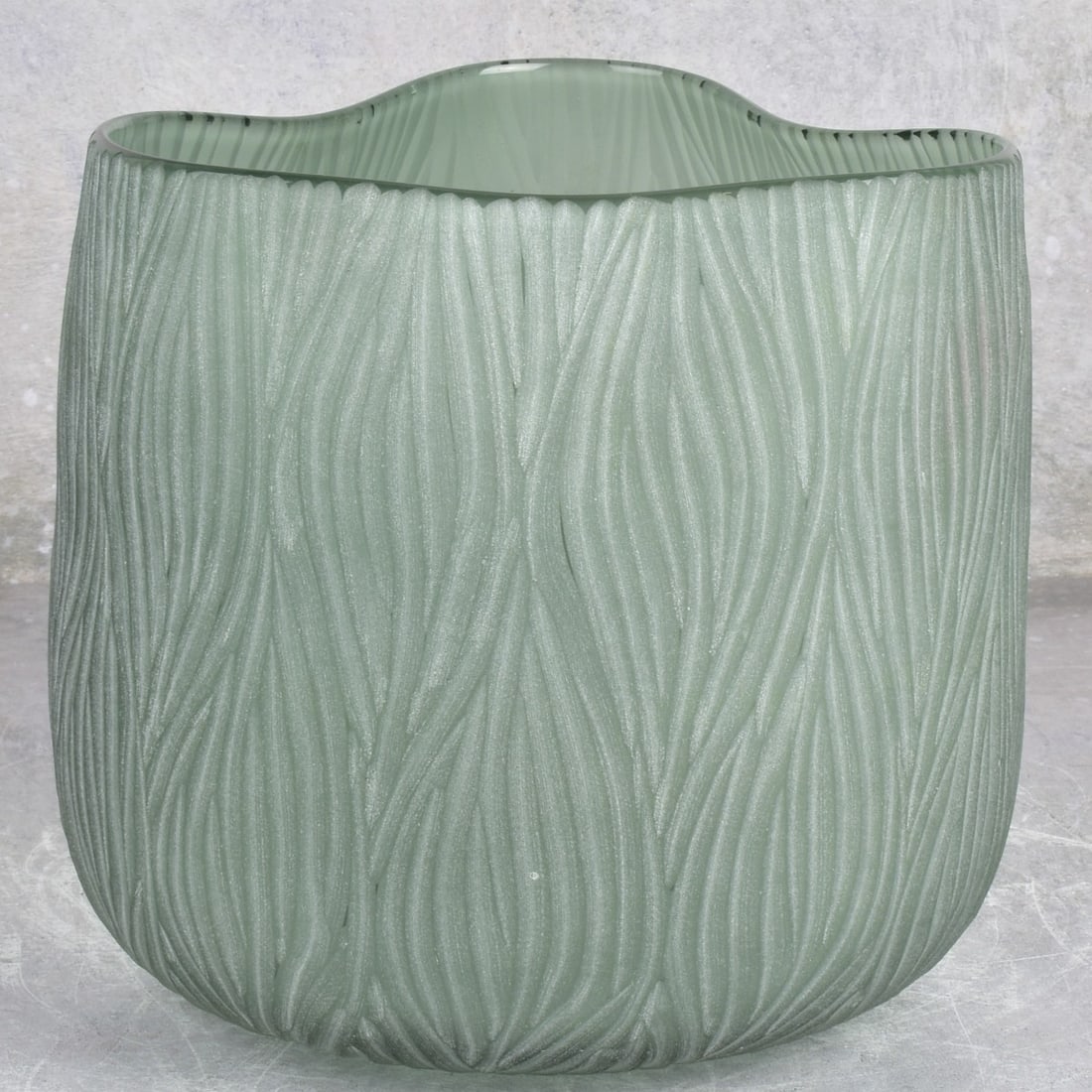Modern Hand Blown Art Glass Vase: Modern Hand Blown Art Glass Green Wave Shape Vase with a Verticle Ripple Effect. Measures: 7-7/8" high, 8-1/4" wide, 8-1/4" deep. Kodner Galleries offers phone and absentee bidding at a low, flat 21% 