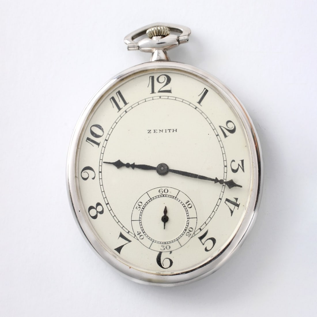 Zenith 18K Pocket Watch: Vintage Zenith 18 Karat White Gold Pocket Watch, Open Face with White Dial. Manual wind movement. Finely engraved case back. Case measures 46.5 x 40.0mm. Approx. gross weight: 50.29 grams. Kodner