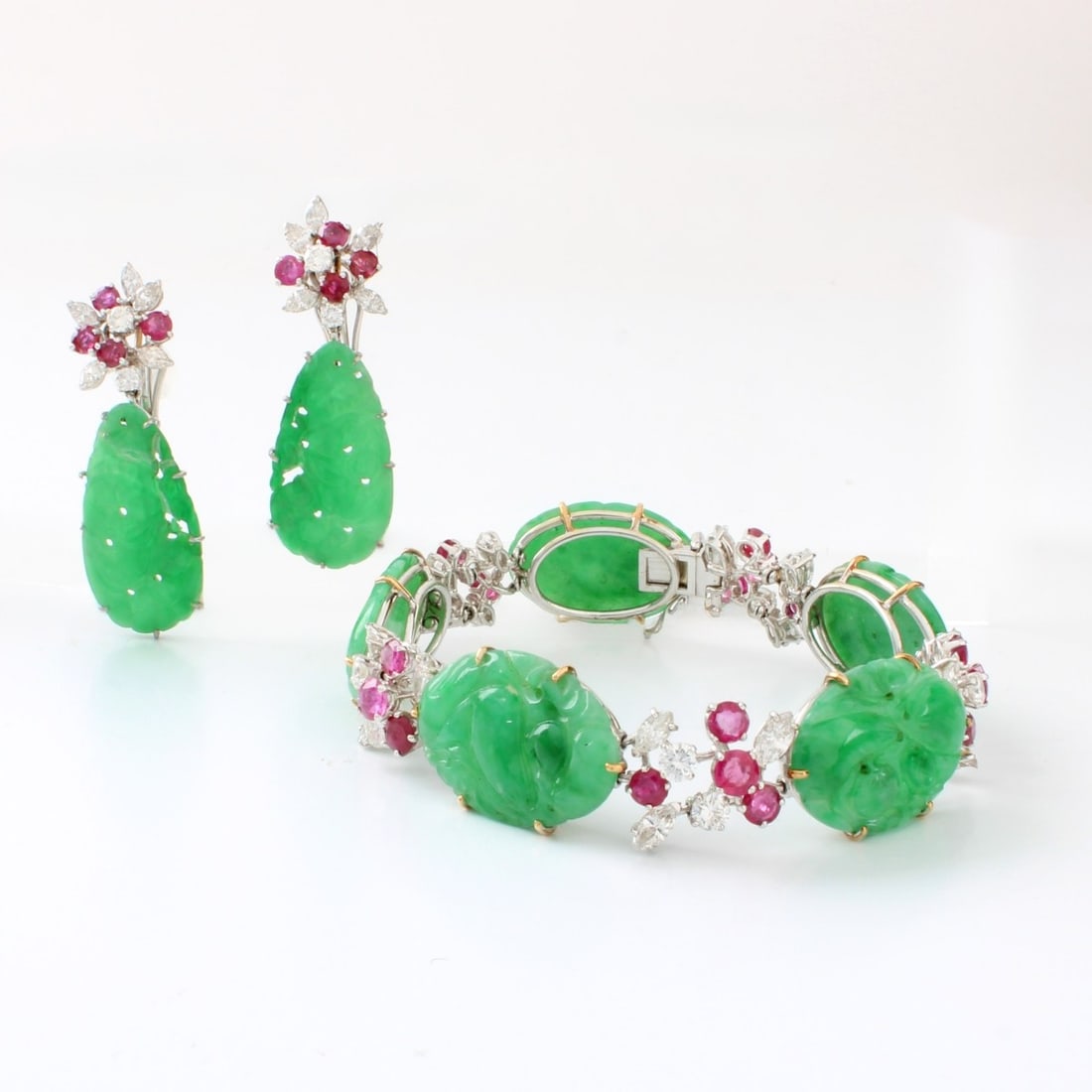 Fratelli Piccini Bracelet and Earrings: Vintage Fratelli Piccini Firenze Hand Carved Jadeite Jade, Approx. 6.75 Carat TW Round Cut and Pear Shape Diamond, 5.25 Carat TW Round Cut Ruby and 18 Karat White Gold Bracelet and Earrings Suite.