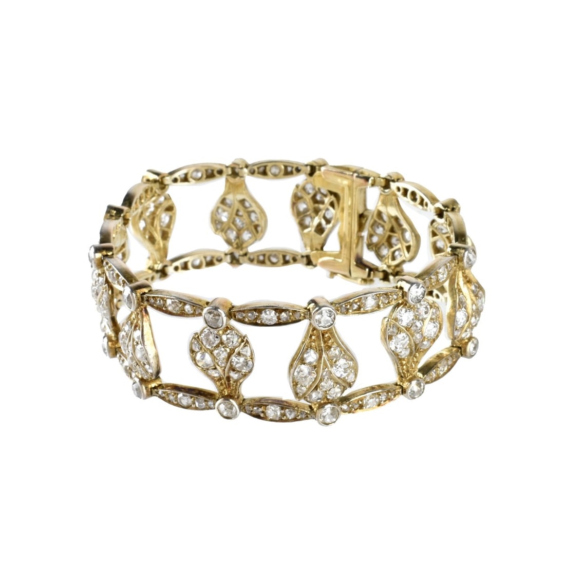 Diamond and 14K Bracelet: Antique 19th Century Approx. 12.0 Carat TW Old European Cut Diamond and 14 Karat Yellow Gold Link Bracelet. Diamonds F-G color, VS1-VS2 clarity. Measures 6-3/4" L, 3/4" W. Approx. weight: 32.37