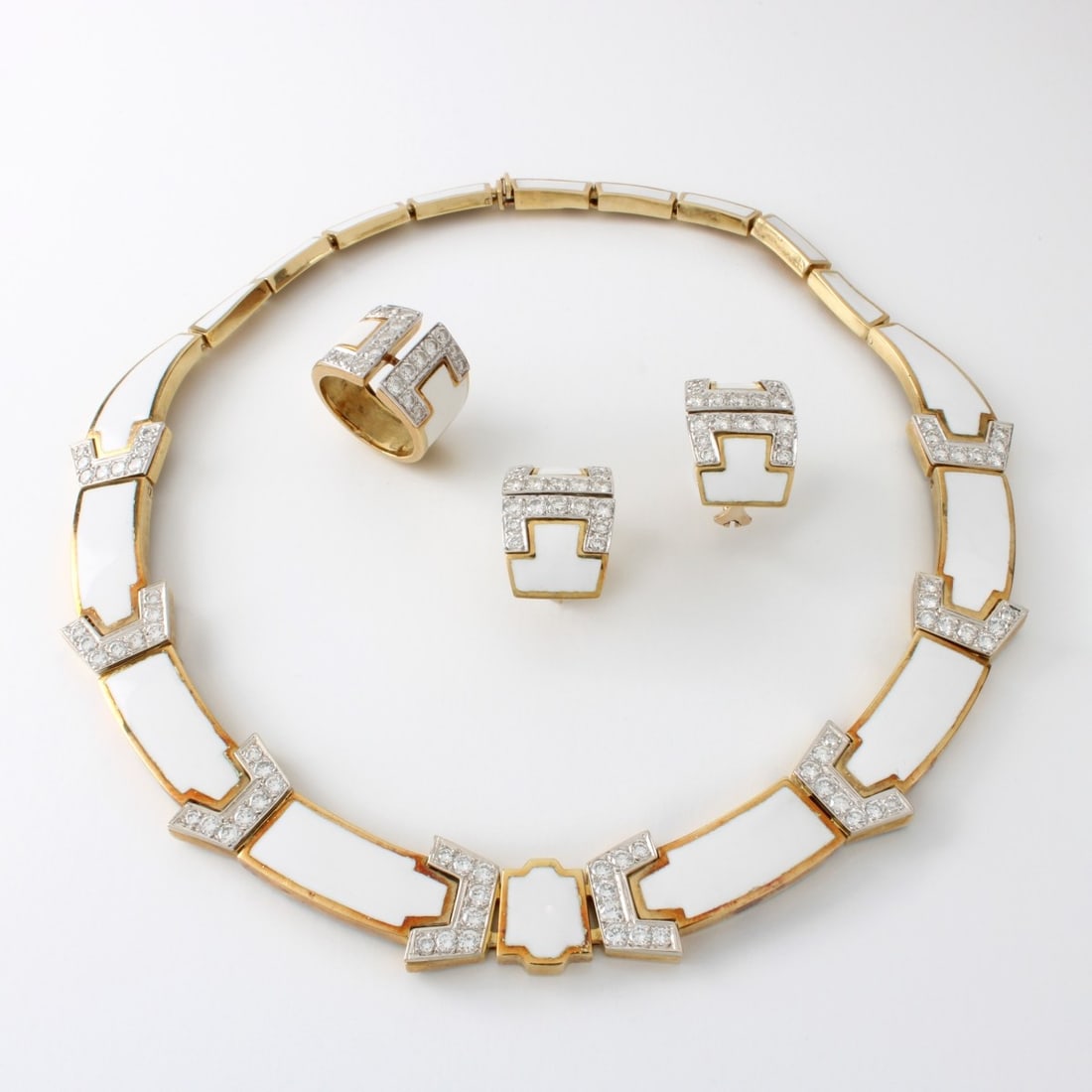 Diamond, Enamel and 18K Suite: Very Fine Vintage David Webb Designed Approx. 10.0 Carat TW Round Brilliant Cut Diamond, White Enamel and 18 Karat Yellow and White Gold Necklace, Earrings and Ring Suite. Diamonds E-F color,