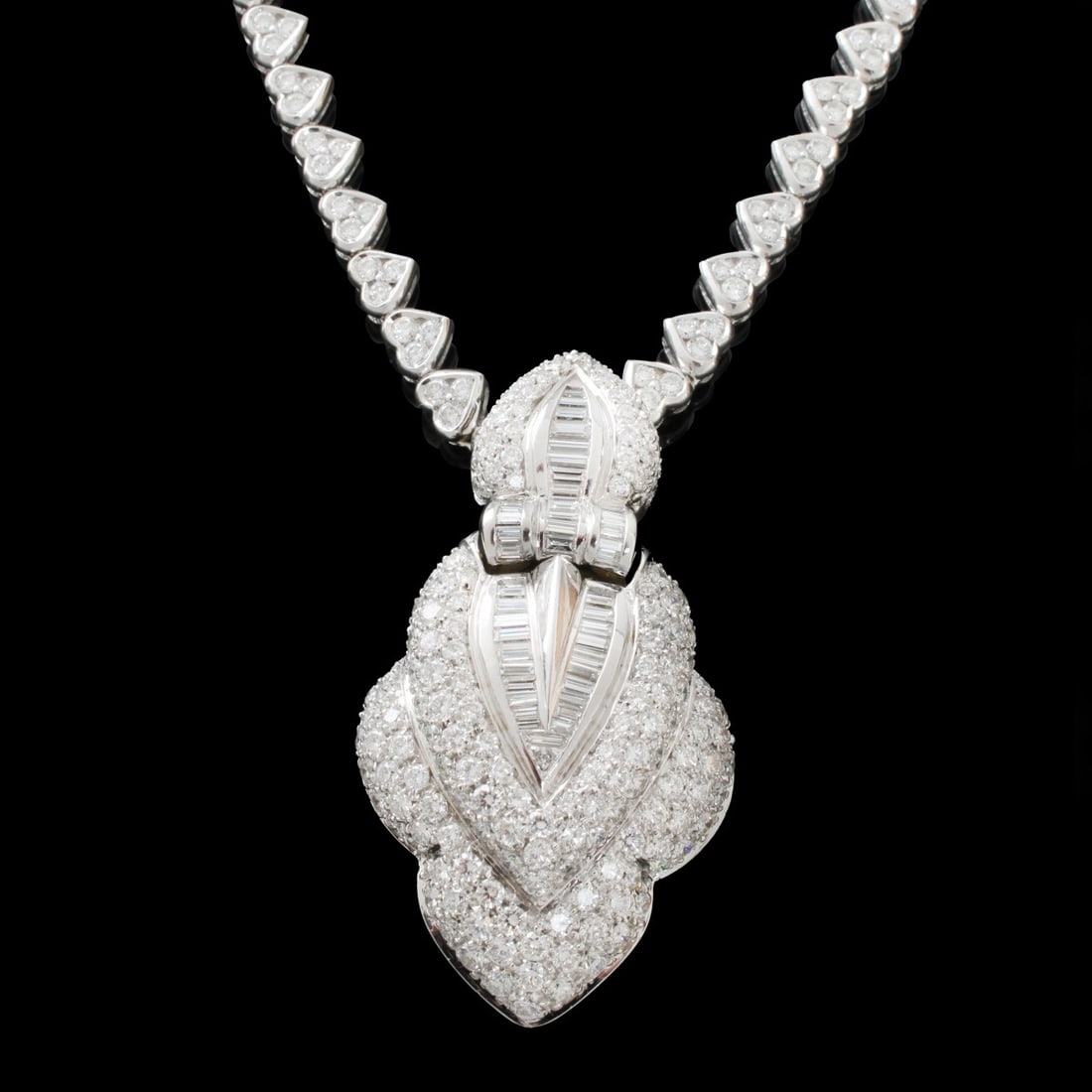 Diamond and 18K Pendant Necklace: Finely Made Approx. 14.0-14.25 Carat TW Diamond and 18 Karat White and Yellow Gold Detachable Pendant Necklace. Necklace set with approx. 6.5-6.75 carats TW one hundred and ninety two round brilliant 