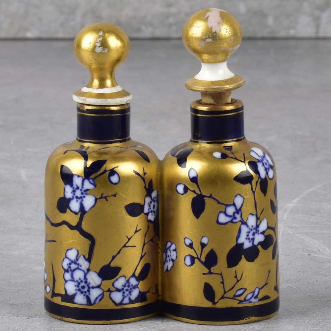 Chinese Double Snuff Bottle: Vintage Gilt and Cobalt Porcelain Double Scent Bottle. Measures: 2-3/4" High, 2-1/8" Wide, 1-1/16" Deep. Kodner Galleries offers phone and absentee bidding at a low, flat 21% buyer?s premium without s