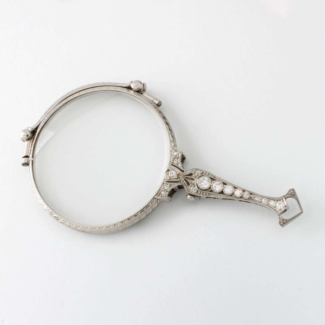 Diamond and Platinum Lorgnette: Antique Approx. .65 Carat TW Old European Cut Diamond and Platinum Lorgnette Glasses. Stamped PLAT. Measure 1-1/2" H, 4" W, 1-1/2" L handle. Approx. gross weight: 27 grams. Kodner Galleries offers pho