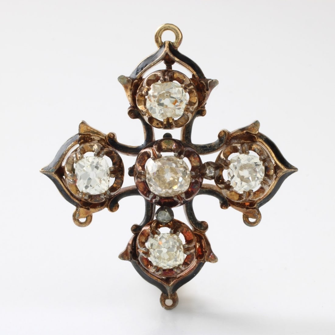 Diamond and 14K Pendant: Antique Approx. 4.50 Carat TW Five Old Mine Cut Diamond and 14 Karat Yellow Gold Cross Pendant. H-J color, SI clarity. Measures 1-1/2" H, 1-1/4" W. Approx. weight: 9.26 grams. Kodner Galleries offers 
