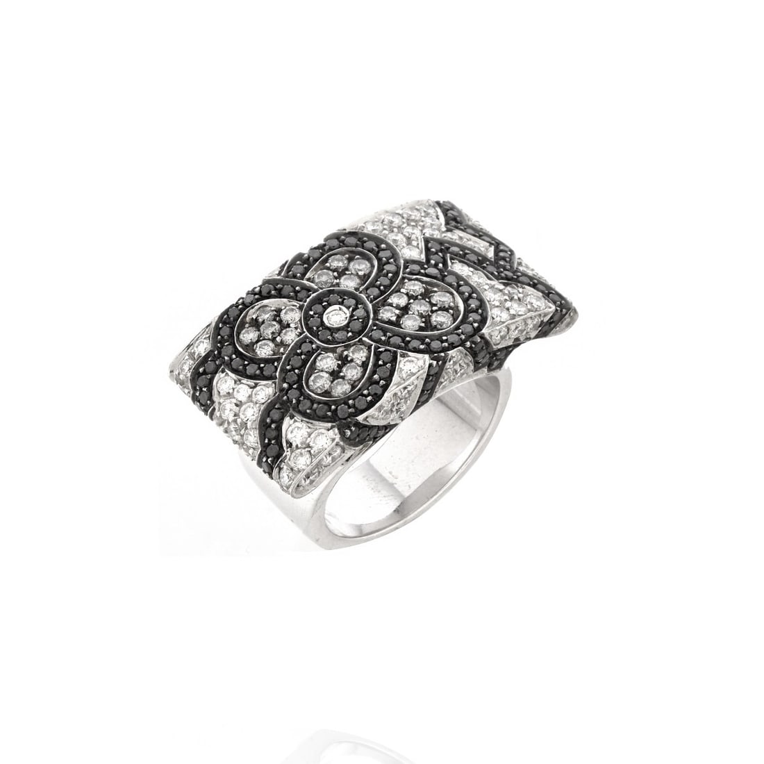 Diamond and 18K Ring: Pave Set Round Brilliant Cut Black, Grey and White Diamond and 18 Karat White Gold Ring. White diamonds F-G color, VS1-VS2 clarity. Stamped 18K 750. Ring size 7-1/2. Approx. weight: 23.03 grams. Kodne