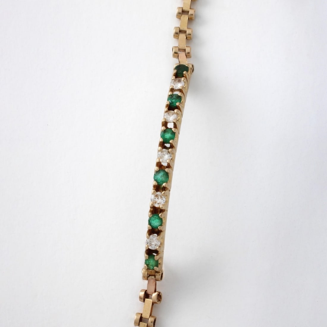 Emerald, Diamond and 14K Bracelet: Vintage Round Cut Emerald, Round Brilliant Cut Diamond and 14 Karat Yellow Gold Bracelet. Emeralds with good color. Diamonds H-I color, SI clarity. Stamped 14K. Measures 7" L. Approx. weight: 6.94 gra