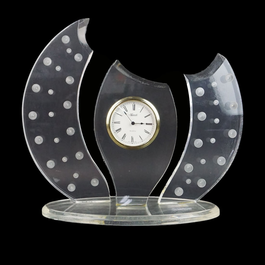 Lucite Clock: Vintage Hermle Lucite Clock. Quartz movement. Overall measures: 17-3/8" high, 19" wide, 8" deep. The gallery does not warranty the running condition of clocks. Kodner Galleries offers phone and