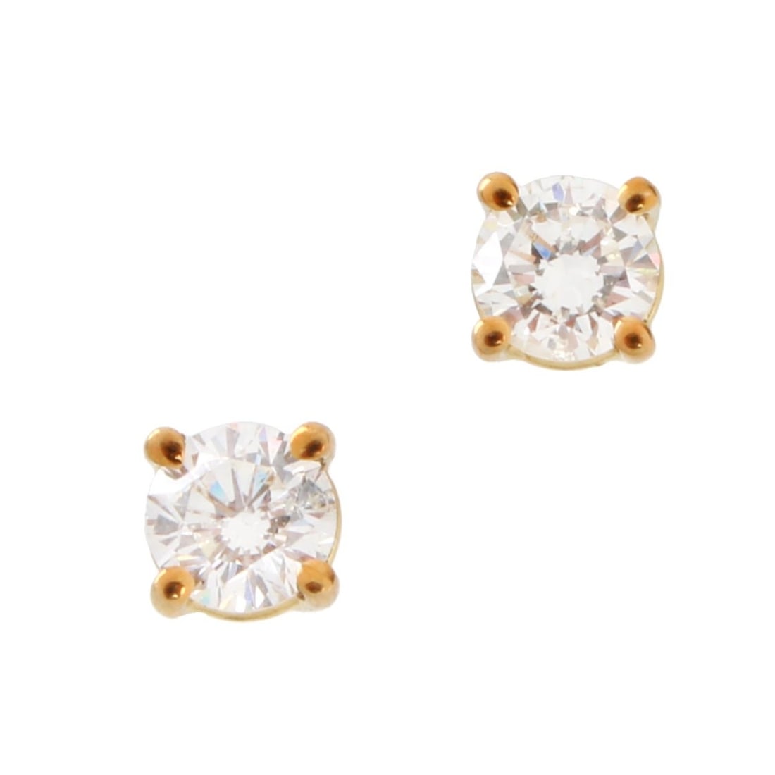 Diamond and 18K Ear Studs: Vintage Pair of Approx. .45 Carat TW Round Brilliant Cut Diamond and 18 Karat Yellow Gold Ear Studs. Diamonds G-H color, SI1-SI2 clarity. Approx. weight: .97 grams. Kodner Galleries offers phone and a