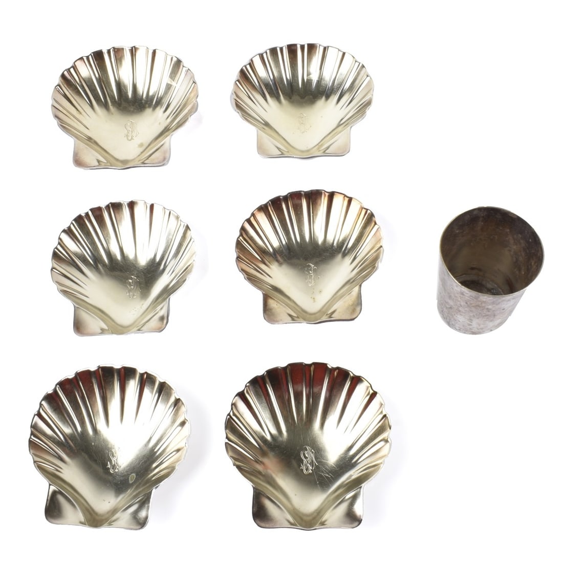 7 Vintage Henckel's Silverplated Tableware: Lot of Seven (7) Vintage Silverplated Tableware to Include (6) J.A. Henckels Shell Form Dishes with Vermeil Bowl along with a Silverplated Mug. Each marked on the base. Dishes are monogrammed en cente