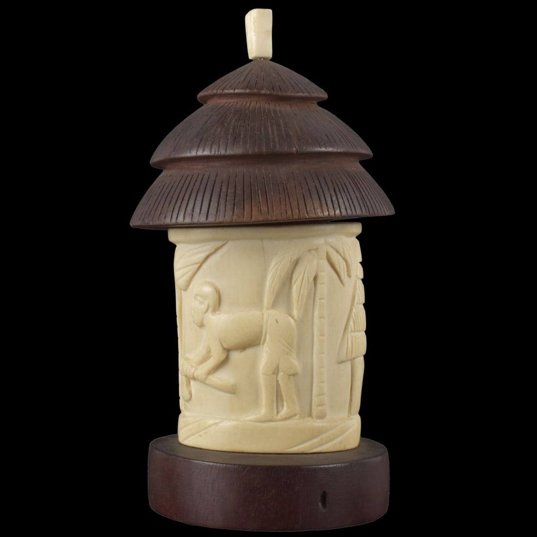 Antique Carved African Hut: Antique Carved Organic Material of an African Hut with Figures. Sculpture measures : 8-1/2" high, 4" wide, 4" deep, base measures: 1" high. We Will Not Ship This Item Outside of the State of Florida. 