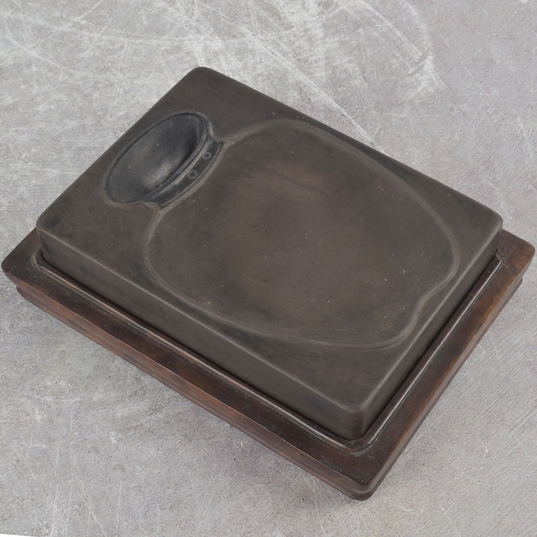 Qing Dynasty Duan Shi Inkstone: Qing Dynasty Duan Shi Inkstone with Rosewood Box. Previously displayed in the Cincinnati Museum from The Hollister Collection. Overall with box measures: 1-7/8" high, 4-3/4" wide, 5-5/8" deep. Kodner