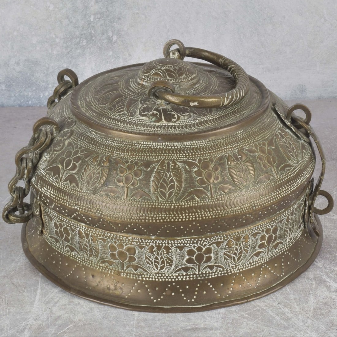 Antique Oriental Copper Cricket Cage: Antique Oriental Copper Cricket Cage with Handle. Decorated with an incised floral design all around and twisted handle. With handle down measures: 5-1/2" high, 8- 1/2" diameter. Kodner Galleries