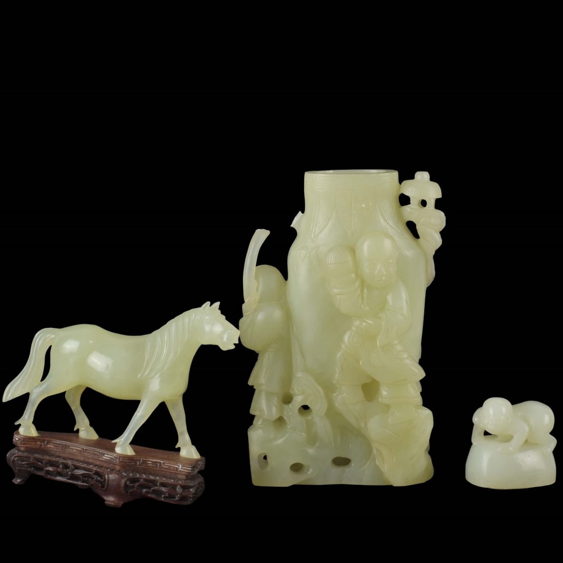Vintage Carved Figural Jade Pieces: Two (2) Vintage Carved Figural Jade Pieces. Consisting of one (1) urn wit cover having three (3) carved figures to the sides and one (1) young child carved to the top, measures: 10" high, 5" wide, 3" 