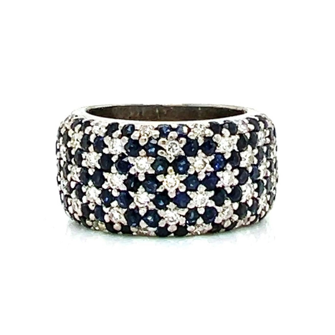 Diamond, Sapphire and 18K Ring: Vintage Approx. .81 Carat TW Round Cut Diamond, 2.0 Carat TW Round Cut Sapphire and 18 Karat White Gold Ring. Diamonds G-H color, VVS-VS clarity. Ring size 6. Approx. weight: 15.9 grams. Kodner