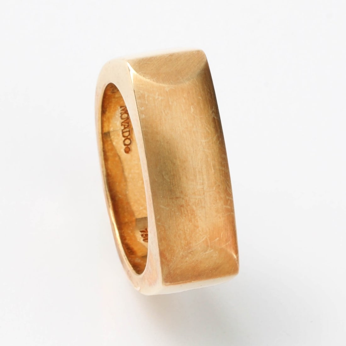 Movado 18K Ring: Man's Vintage Movado Heavy 18 Karat Yellow Gold Ring. Signed, stamped 18K. Ring size 9-1/2. Approx. weight: 24.32 grams. With Movado box. Kodner Galleries offers phone and absentee bidding at a low,