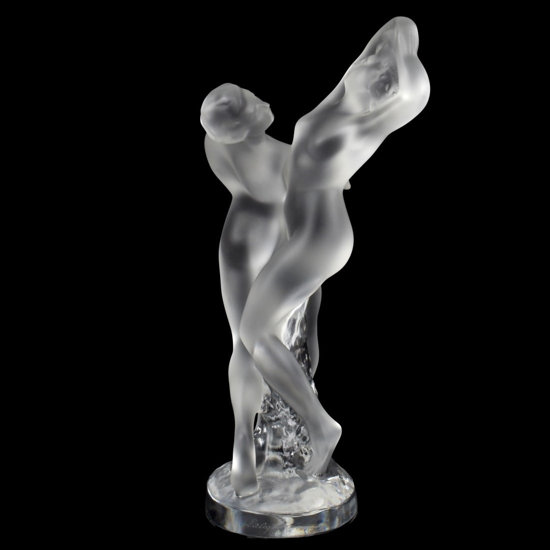 Lalique France "Two Dancers" Sculpture: Lalique France "Two Dancers" Crystal Sculpture in Clear and Frosted Glass. Signed "Lalique France" in script to the side of the base. Measures: 10-1/8" high, 5" wide, 4" deep. Kodner Galleries offers