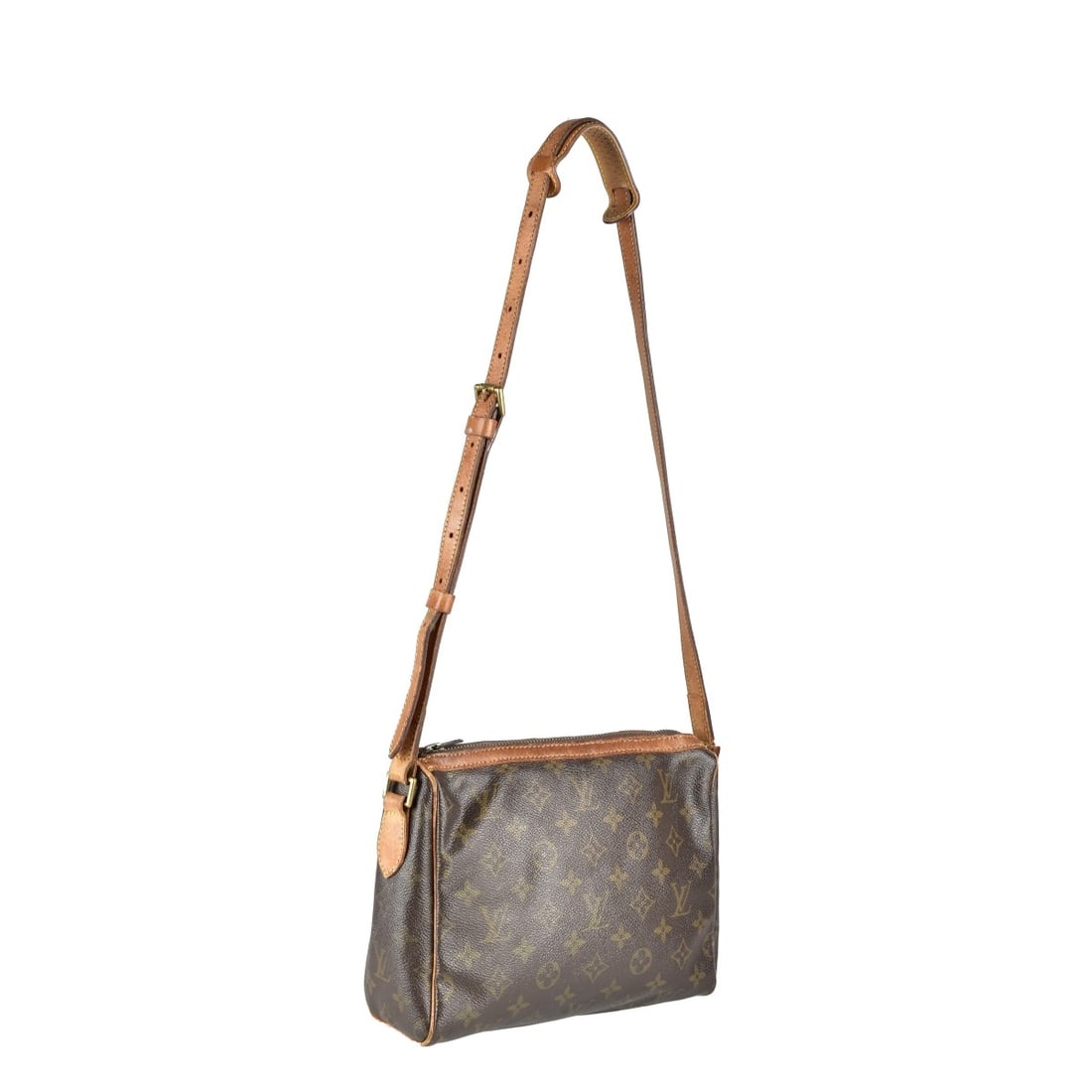 Louis Vuitton Soft Trunk Leather Bag: Louis Vuitton Cross Shoulder Bag. Measures: 7" H, 9" W, 3" D. Kodner Galleries offers phone and absentee bidding at a low, flat 21% buyer?s premium without surcharge or hidden fees. For information,